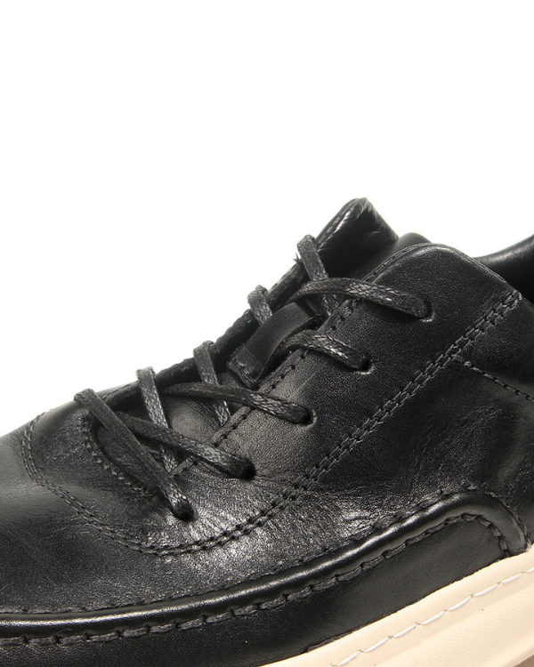 The Black Moc-Toe Leather Sneaker